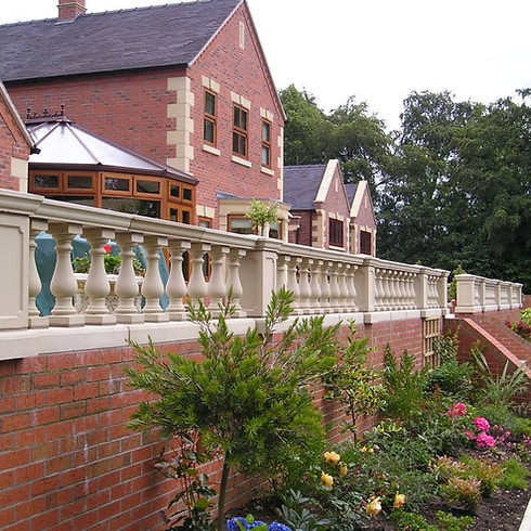 Balustrades outside a house with some plants