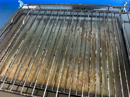 An uncleaned oven rack
