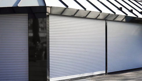 closed-business-shop-or-store-front-with-roller-sh-2021-10-18-12-49-06-utc_edited.jpg