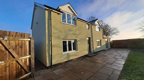 Modern rendered two storey house exterior with driveway