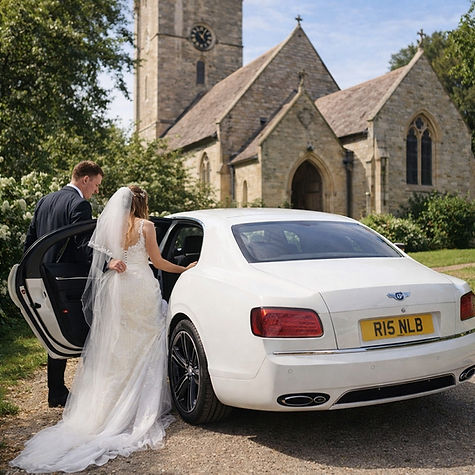 Bride getting into a luxury white car