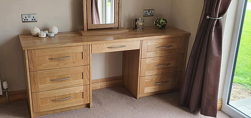 Light oak wooden bedroom chest of drawers and dressing table set