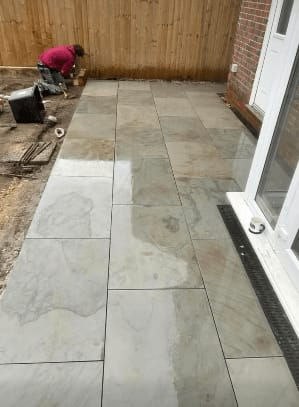 A patio with porcelain tiling