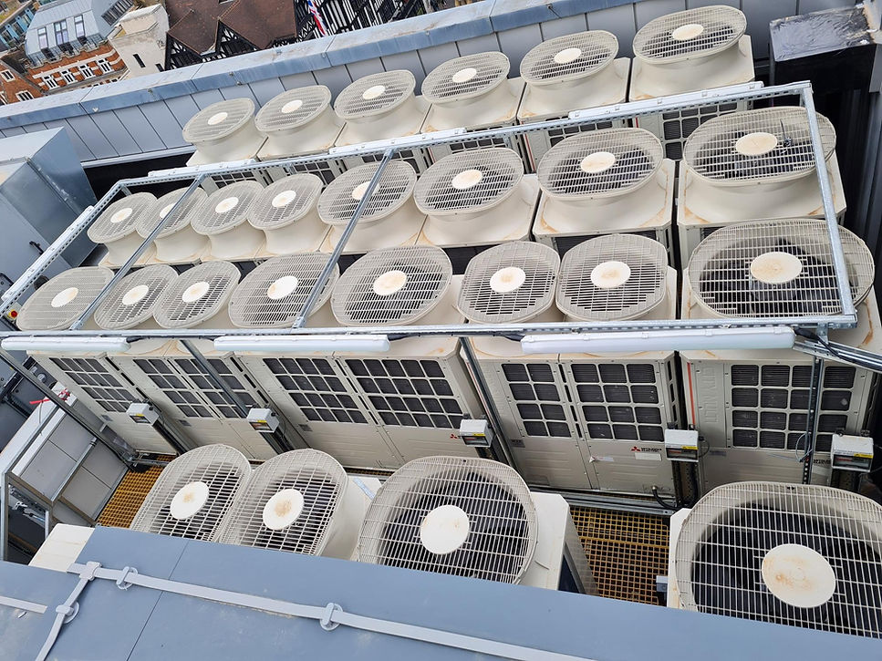 Industrial Mitsubishi AC units installed on a rooftop