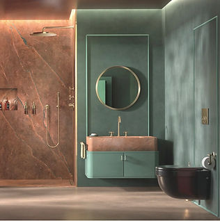 Modern bathroom suite showing a sleek glass shower enclosure and illuminated mirror