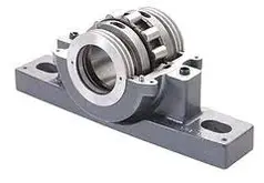 A metal bearing housing with a cylindrical inner mechanism