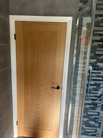 A wooden door of a bathroom