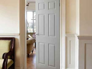 View through doorway into a furnished dining room