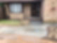 A newly laid stone pathway leads to a house