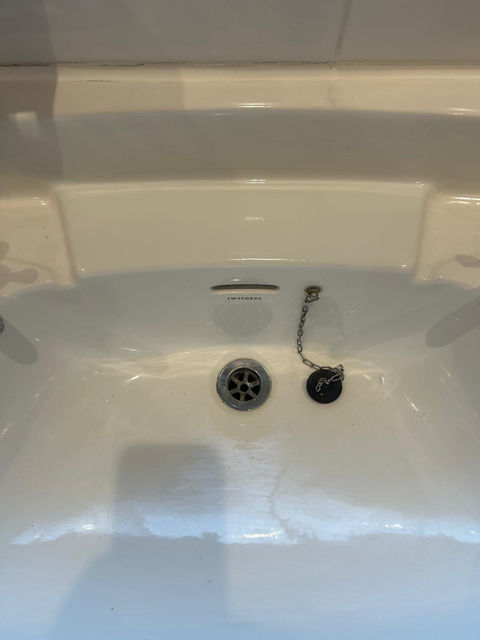 A white sink after maintenance