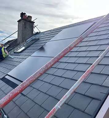 slate roof with solar panel installation