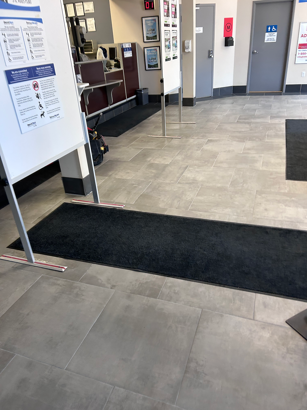 Completed commercial floor tile installation at DriveTest Ontario Centre in Sault Ste. Marie by Nort