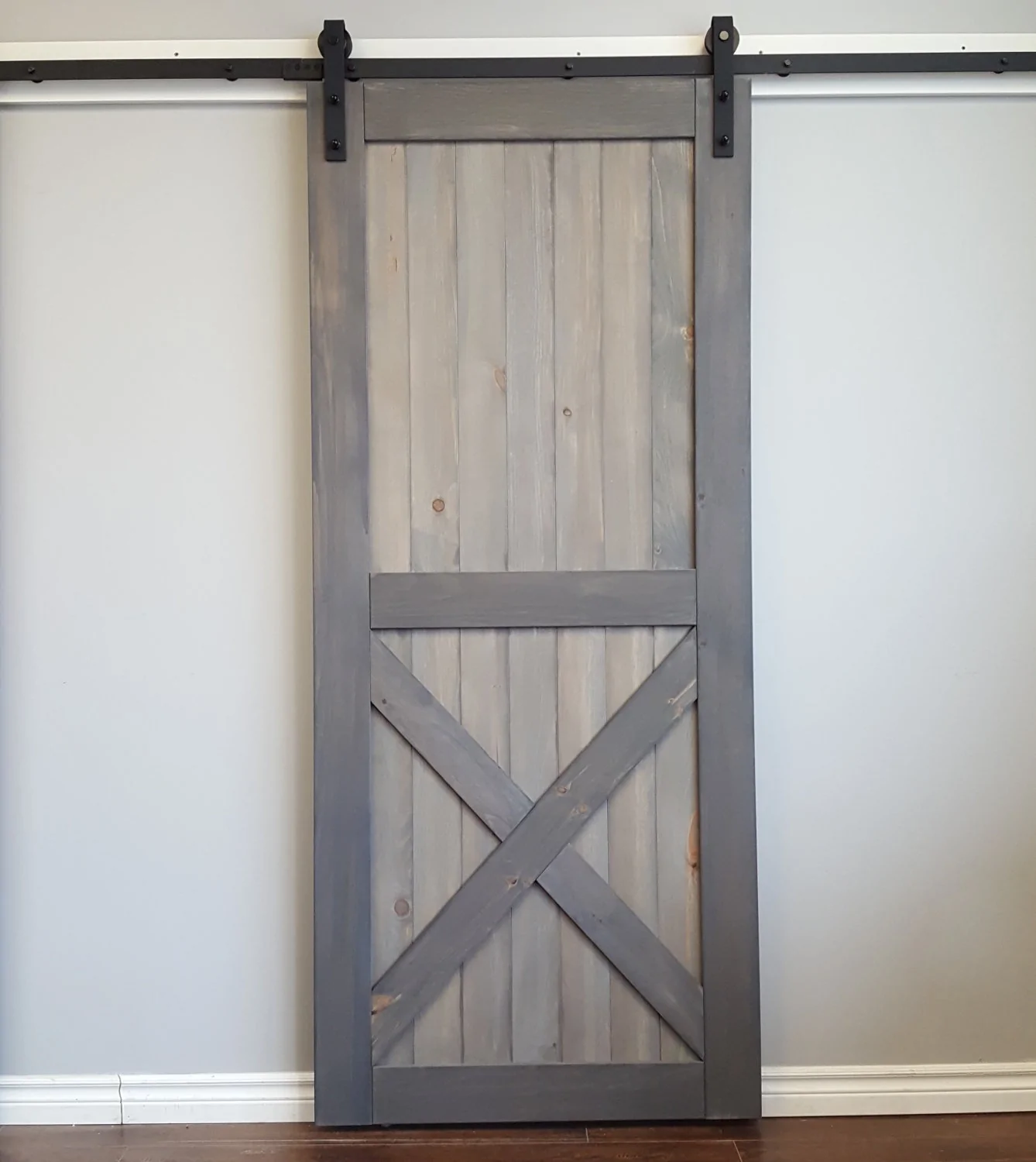 Half_X_barn_door_with_soft_close_bent_strap_barn_door_hardware_angle_1338x.webp