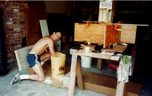 Man mixing materials in a workshop for silicon carbide.