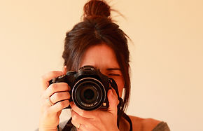 Woman Holding Camera