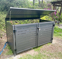 Grey double gate pool pump enclosure. On Click, the user is directed to an example gallery of Pool Pump and Heat Pump Enclosures.