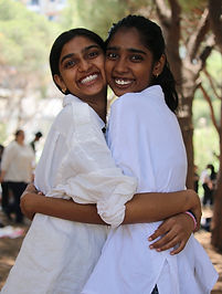 refugee children embracing