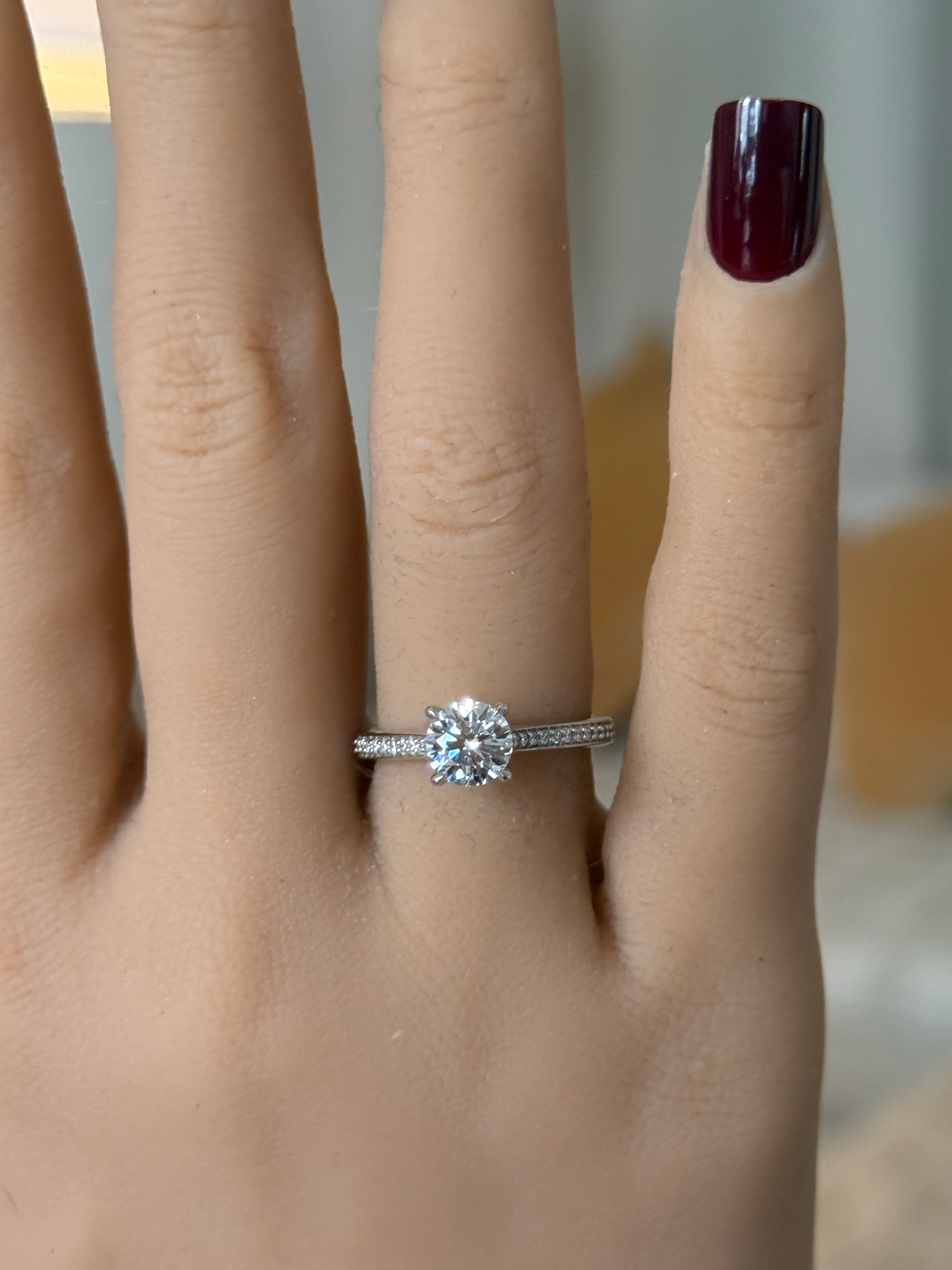 Round Solitaire Ring with Side Diamonds