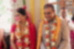 Bride and Groom are showered with flowers after the pheras are complete