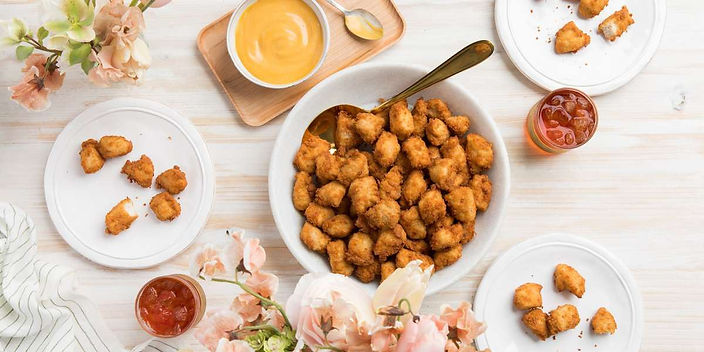 A bowl of Chick-fil-A Chicken Nuggets being eaten from a catering order.