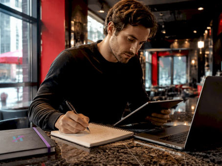 Trader working on strategy backtesting at home desk