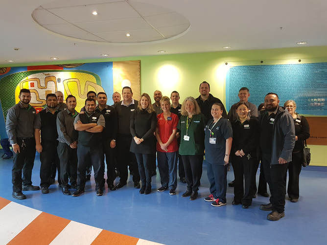 Countdown staff with Middlemore Foundation CEO Sandra Geange