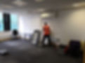 Orange Clearance Ltd team sorting office junk