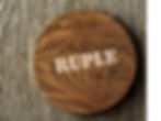 Maker David Ruple's RUPLE sign displayed on rustic wood