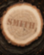 Maker Noah Smith's SMITH sign displayed on rustic wood
