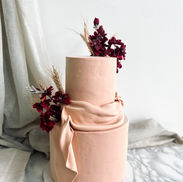 2 tiers cake with fondant drape