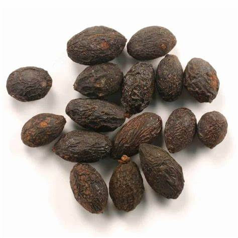 Thumbnail: Close-up shot of several brown, oval-shaped nuts on white background.