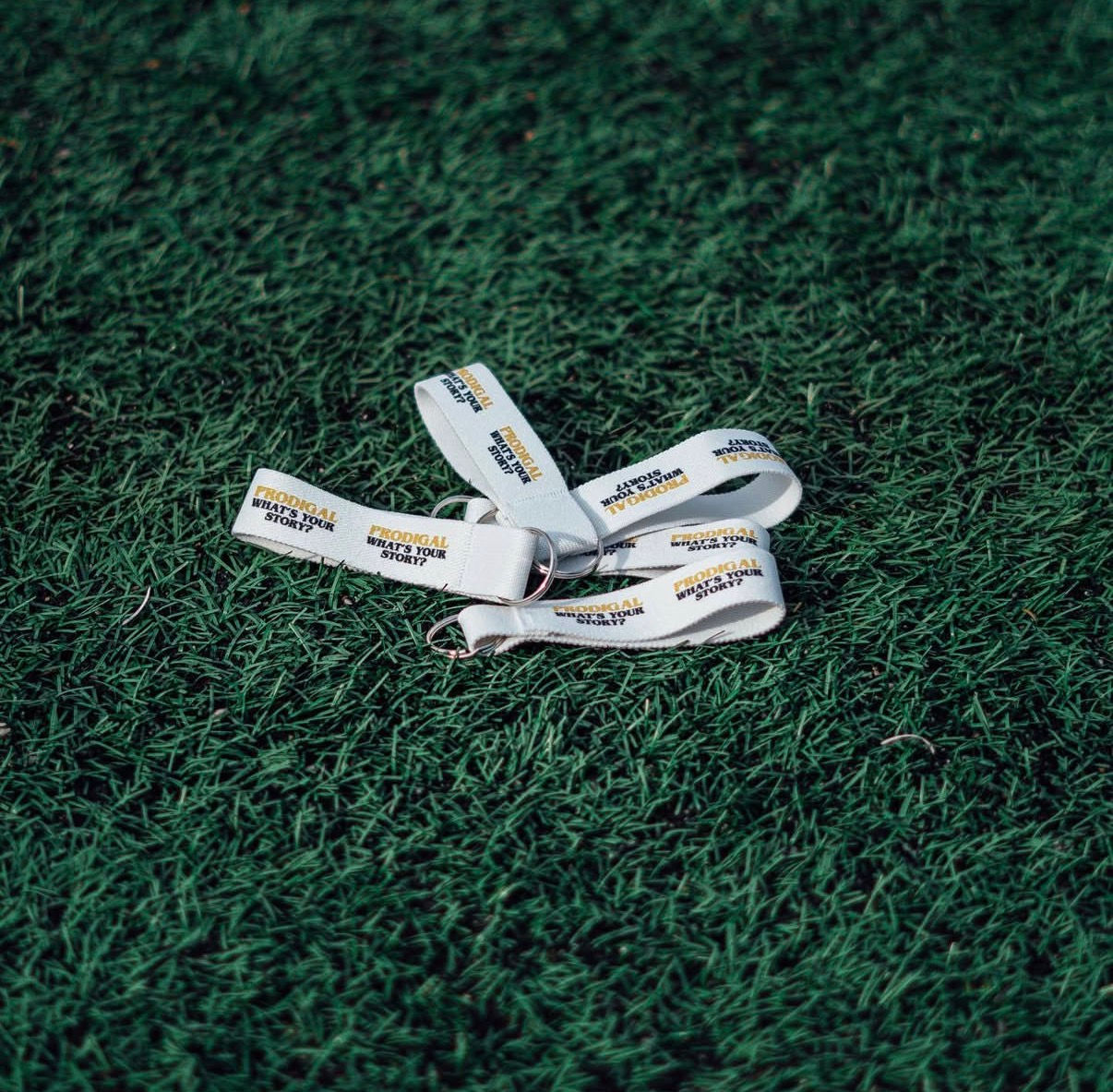 'WHATS YOUR STORY' KEYCHAIN