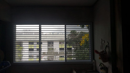 White Powder Coated Sliding Windows c/w Light Grey Glass and Cat-Proof Grilles
