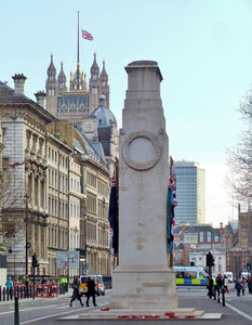 The Cenotaph's north face, Whitehall, London. Houses of Parliament in background