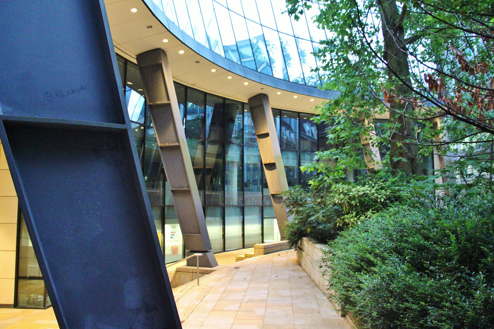 Norman Foster's 100 Wood Street. The rear ground floor floor and supports for the upper levels curving around the plane tree of St Mary Staining