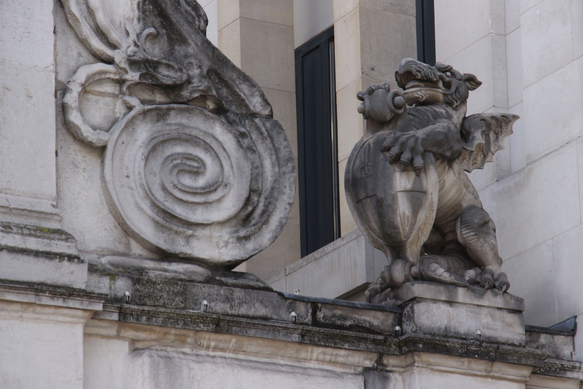 A dragon supporter of the City of London shield, Temple Bar, carved by Tim  Crawley