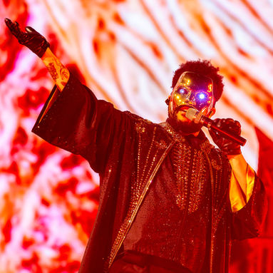 Review + Photos: The Weeknd Puts On a Spectacle Despite Rain Showers