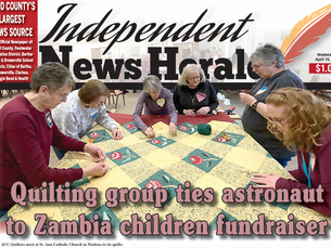 Quilting group ties astronaut to Zambia children fundraiser