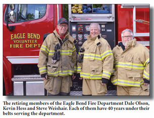 Forty years of service to their community . . .Three Eagle Bend firefighters hang up their hoses