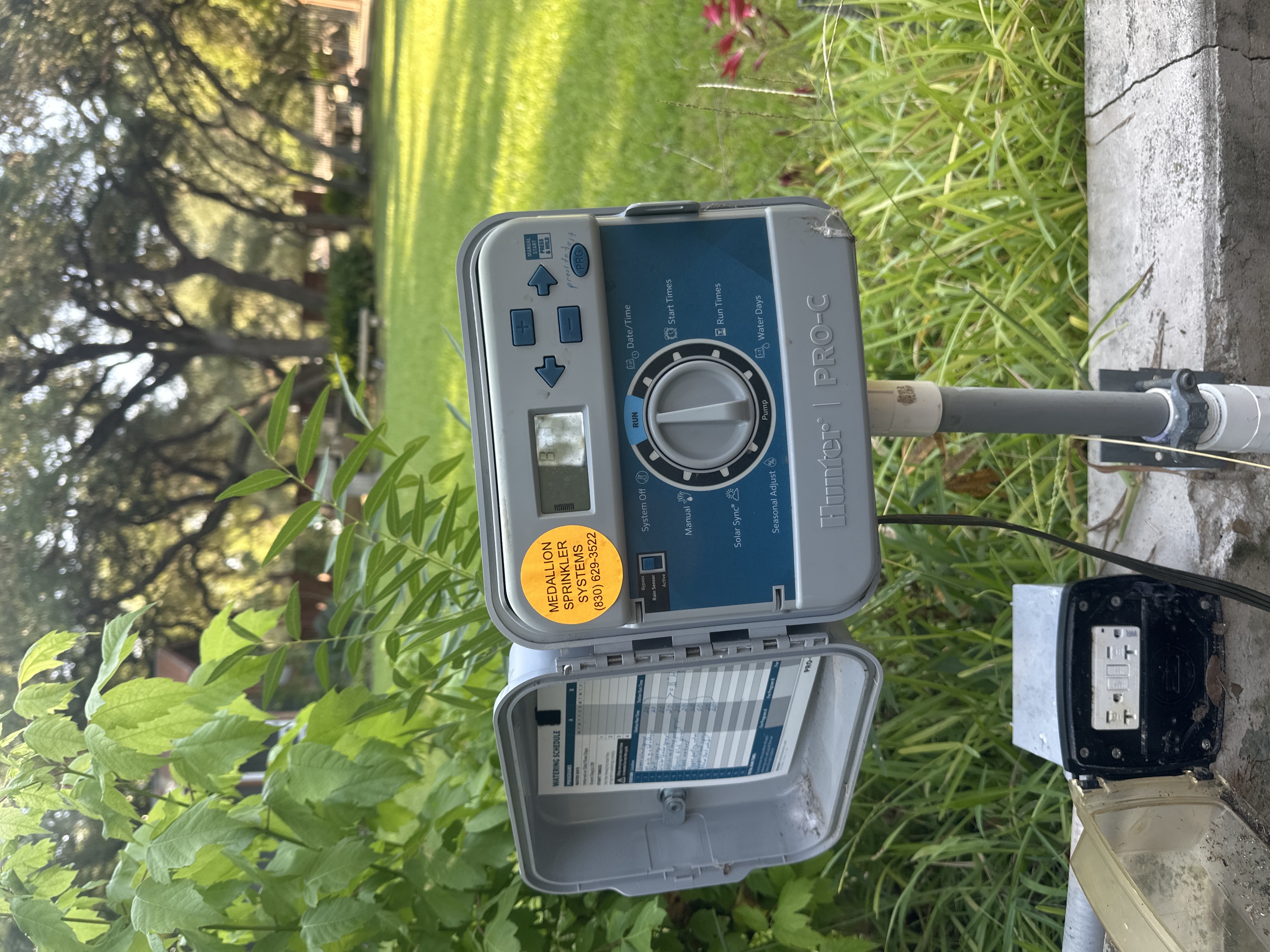 Close up of a smart lawn irrigation sprinkler in action