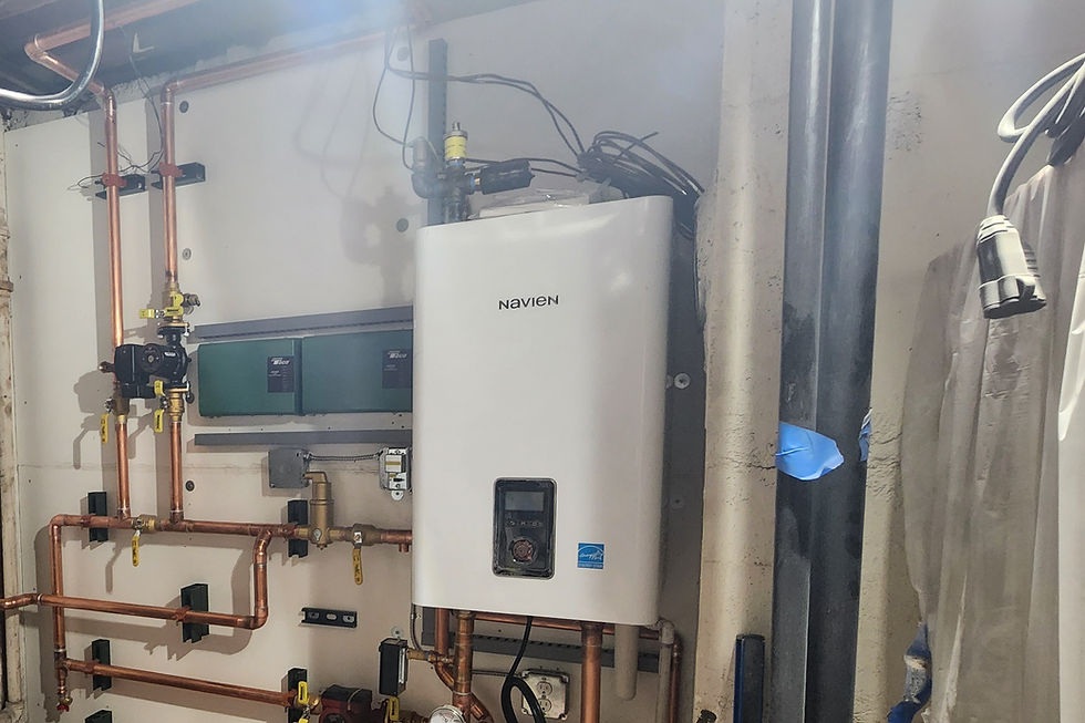Wall-hung condensing boiler with zone controls and near-boiler piping in a Colorado mechanical room