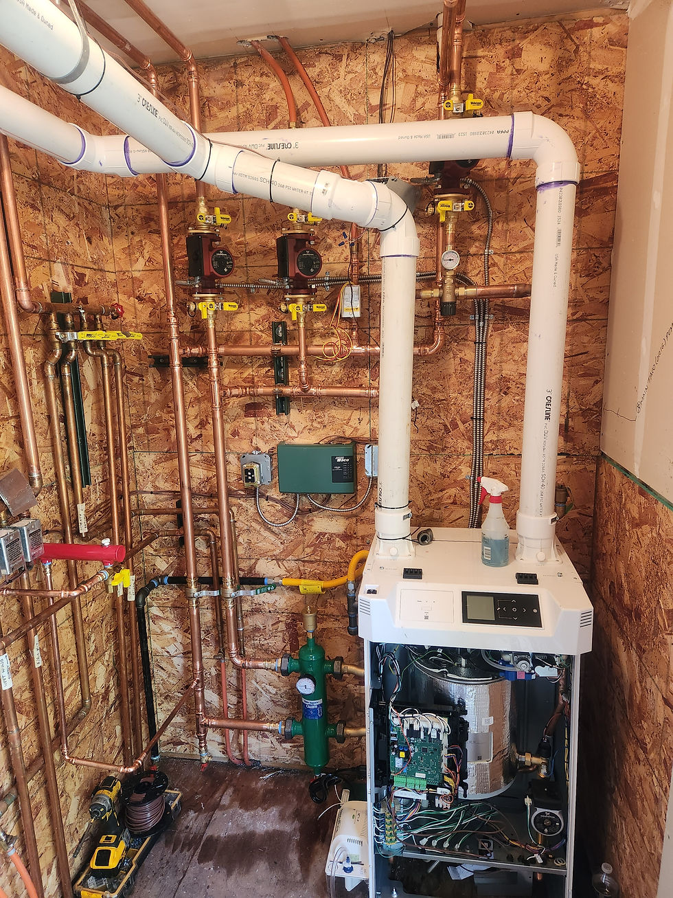 High-efficiency boiler with PVC intake and exhaust venting in a Littleton basement