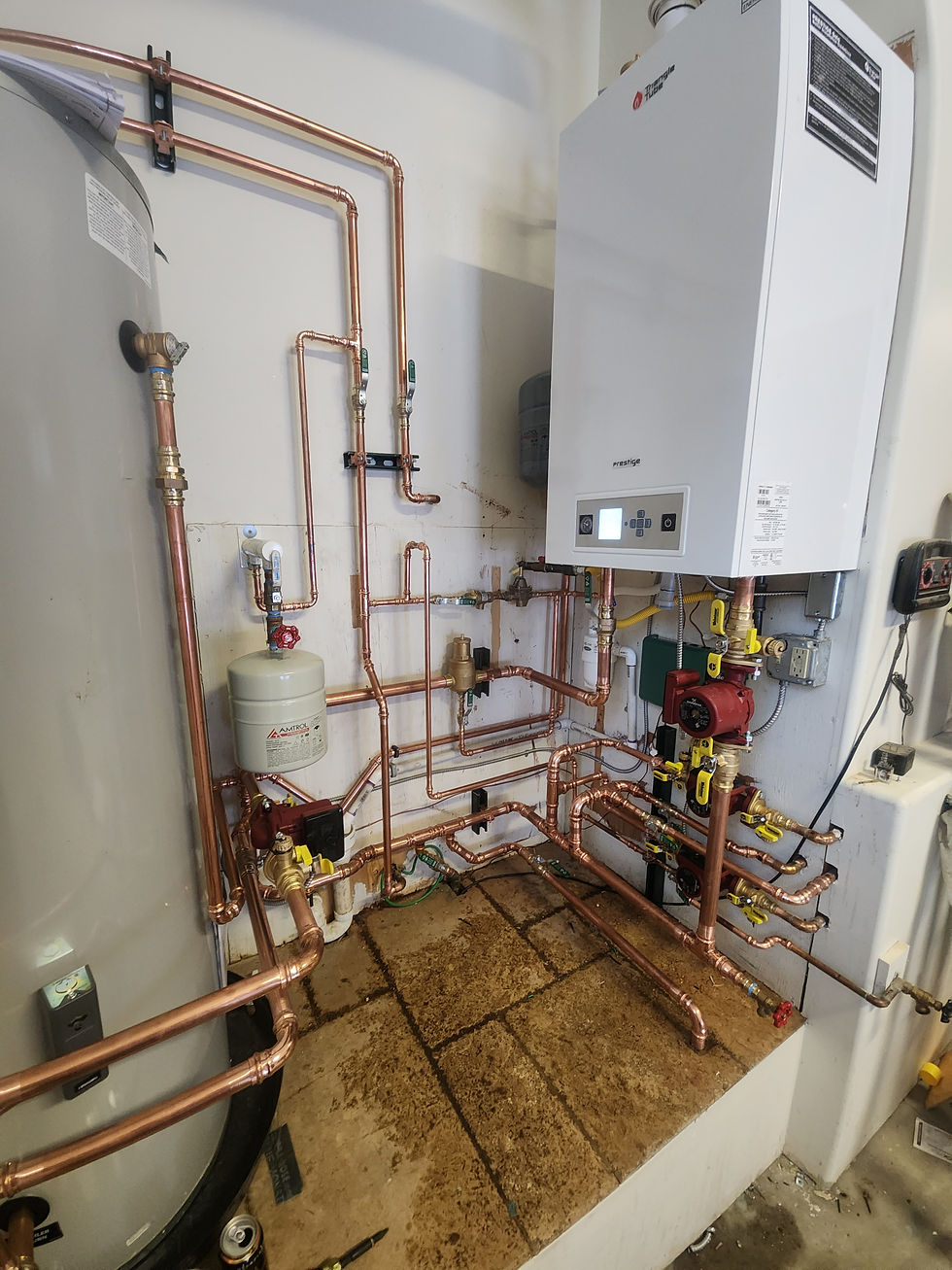 New condensing boiler and copper near-boiler piping after a replacement