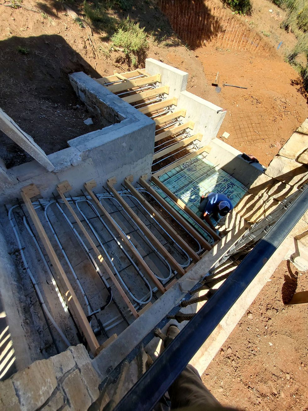 Snowmelt tubing installed in concrete stairs in Littleton, Colorado