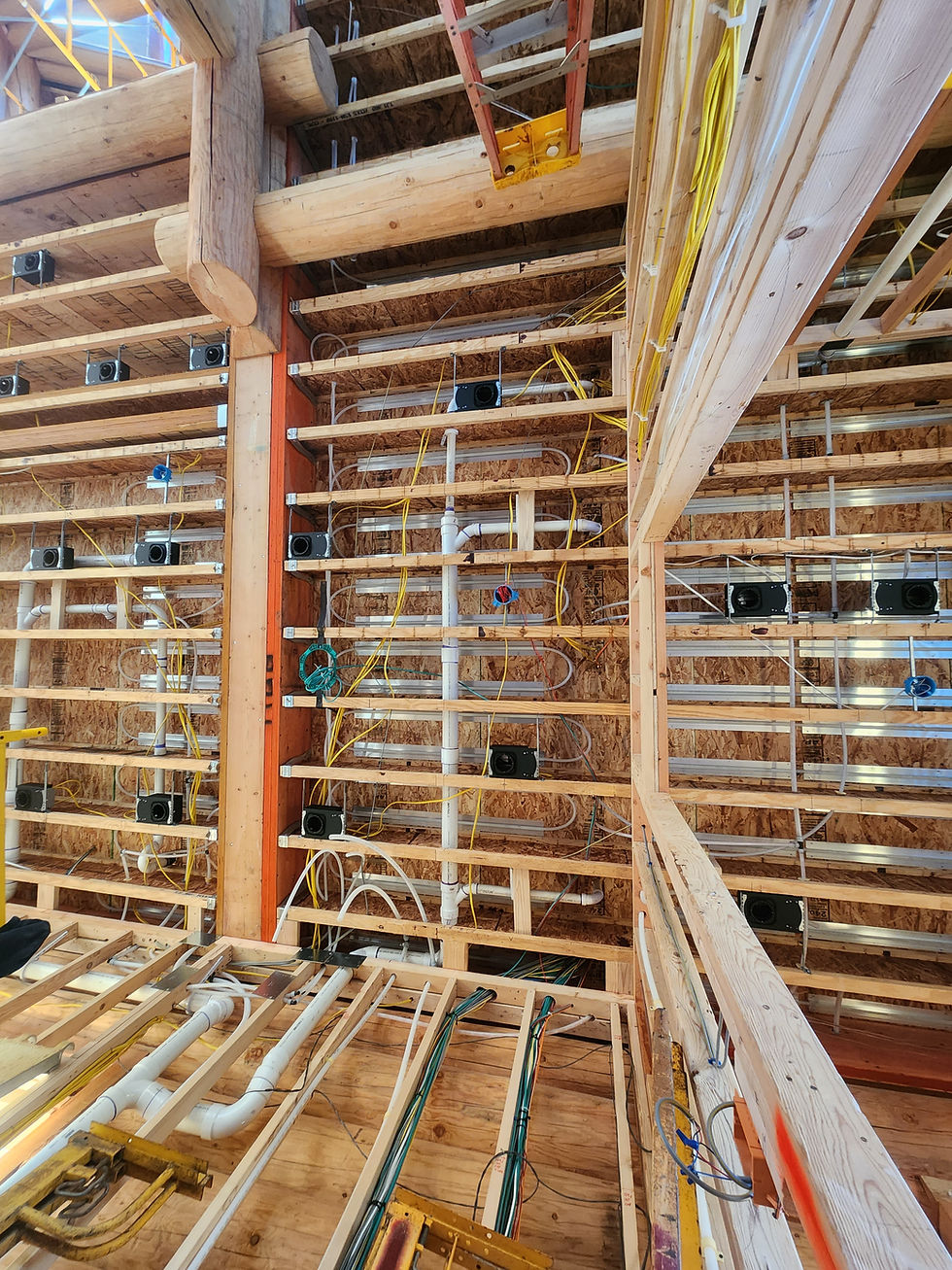 Staple-up radiant tubing running through floor framing