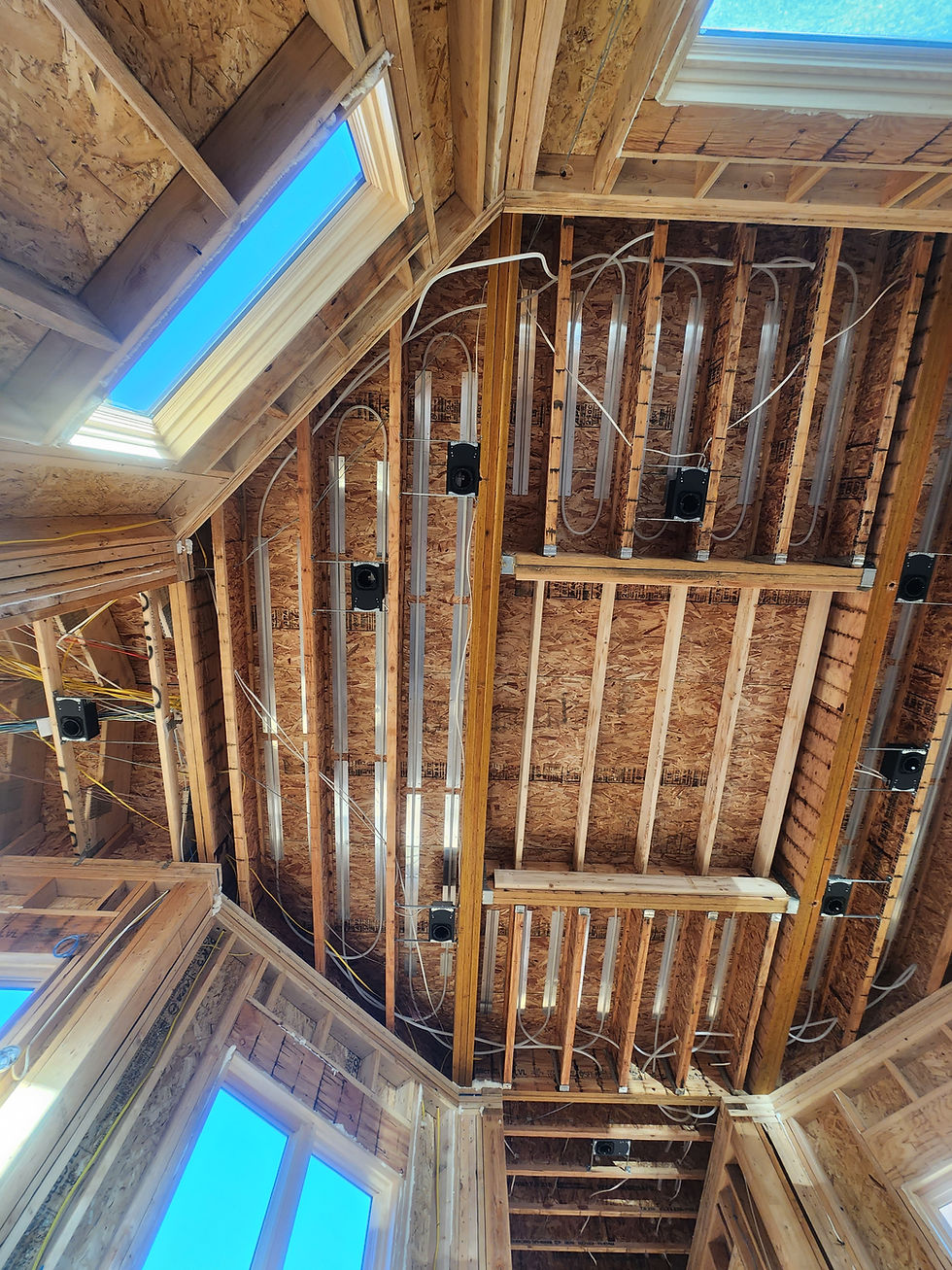 Under-floor staple-up radiant tubing between floor joists