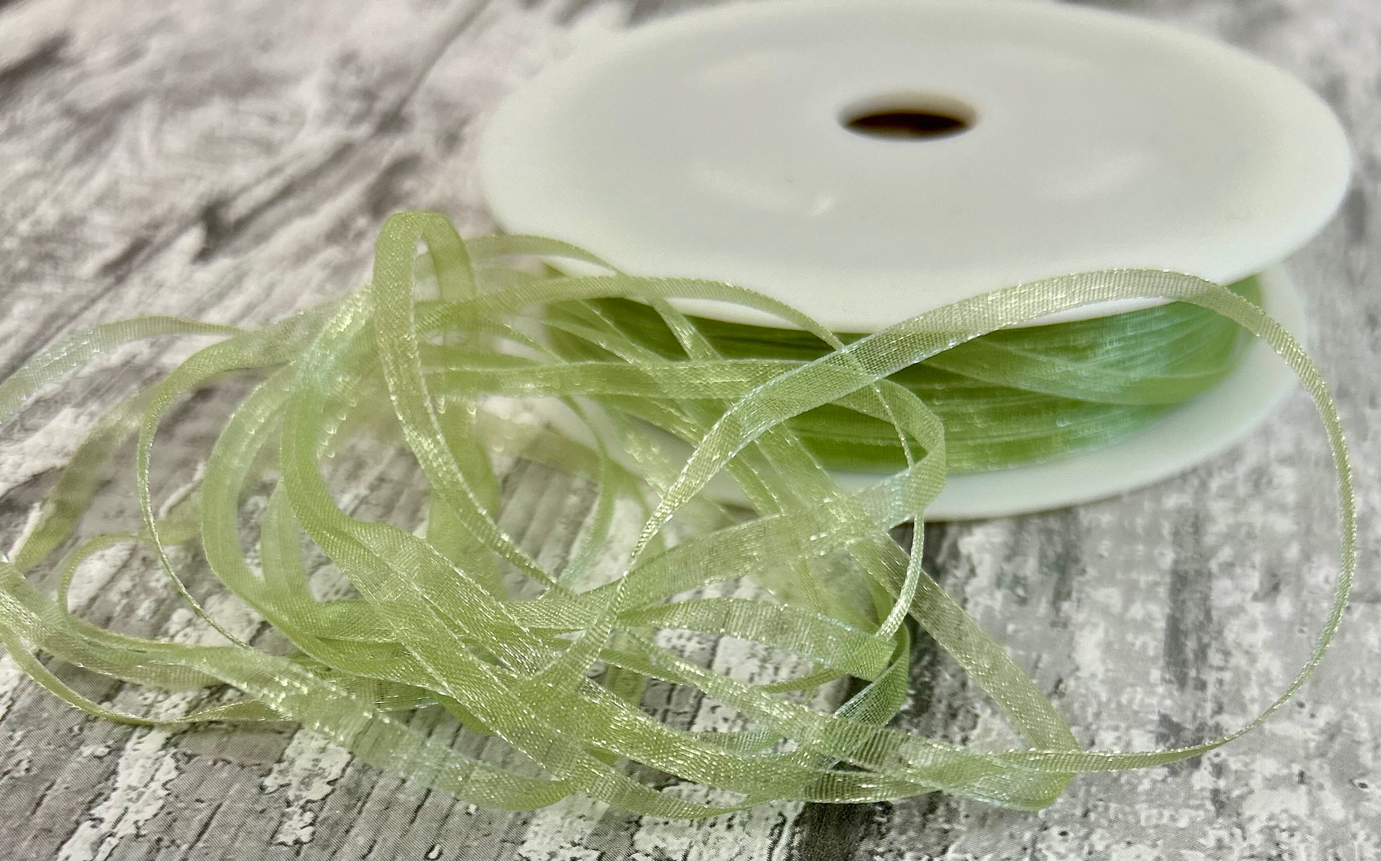 Pale Green Sheer Ribbon 3mm - 50 Metres- Craftmania Stock Photo