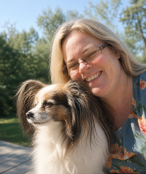 Jody holding her beloved Chewy.