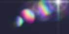 Soft rainbow bubble lens flare reflections with a star-shaped light glare