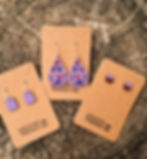 Variety of purple earrings